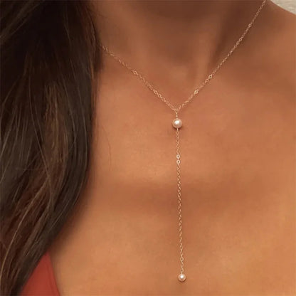Elongated Pearl Necklace